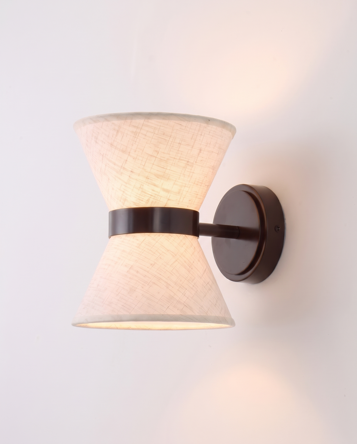 The Hourglass seen from the side, glowing up and down the wall