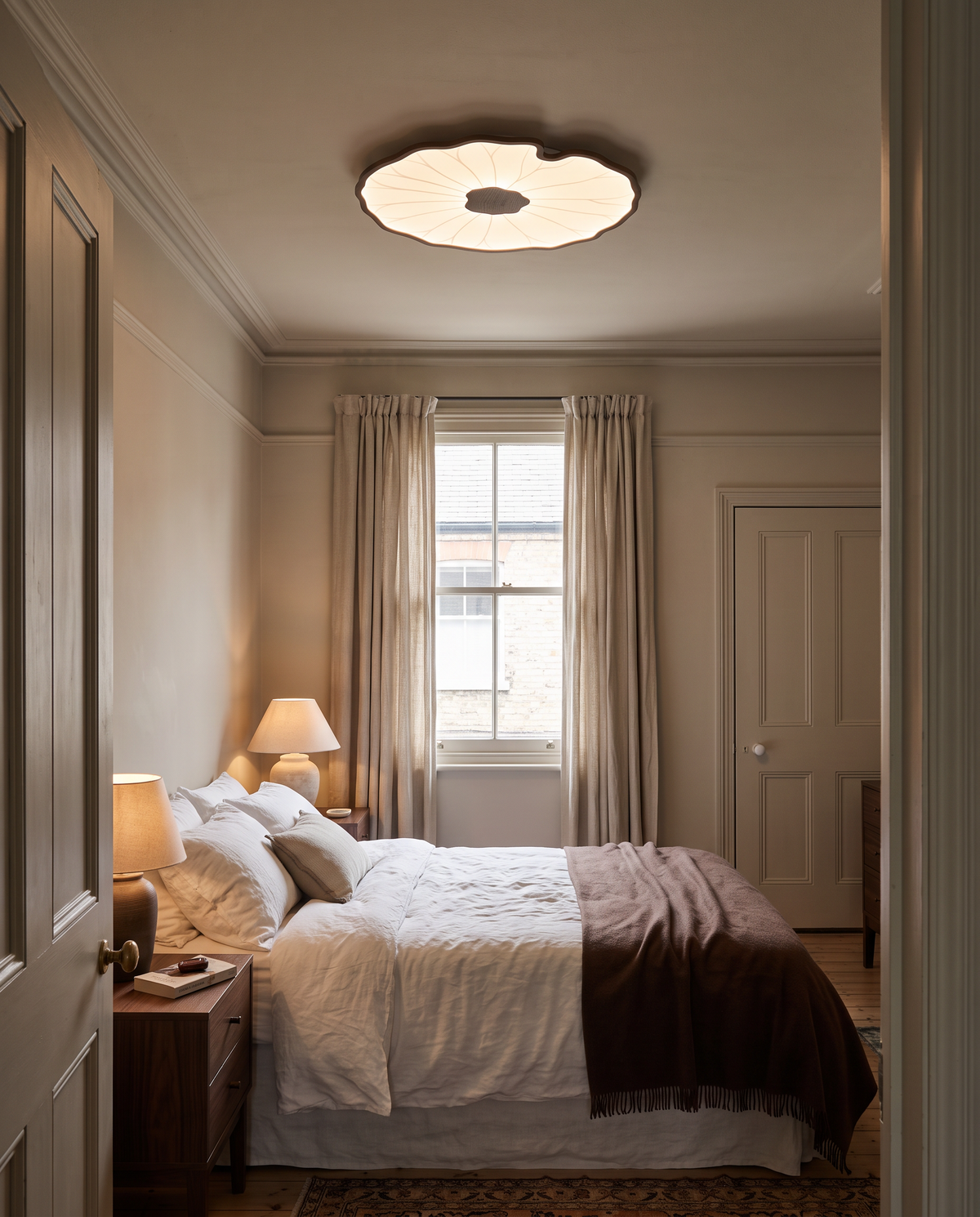 A Lilypad in Walnut Effect above the bed in a Victorian terrace