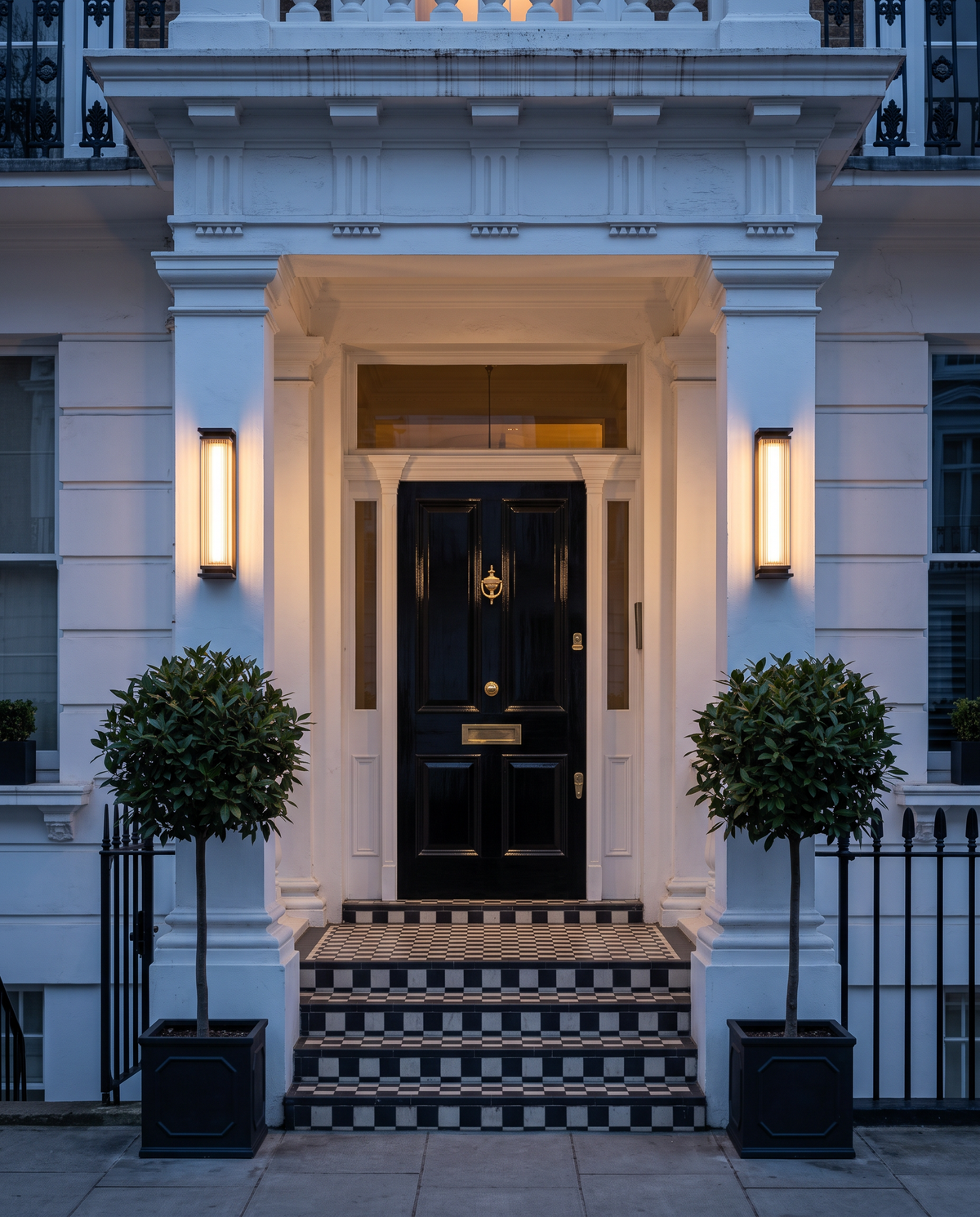 Two Obelisk lights either side of a Regency townhouse front door