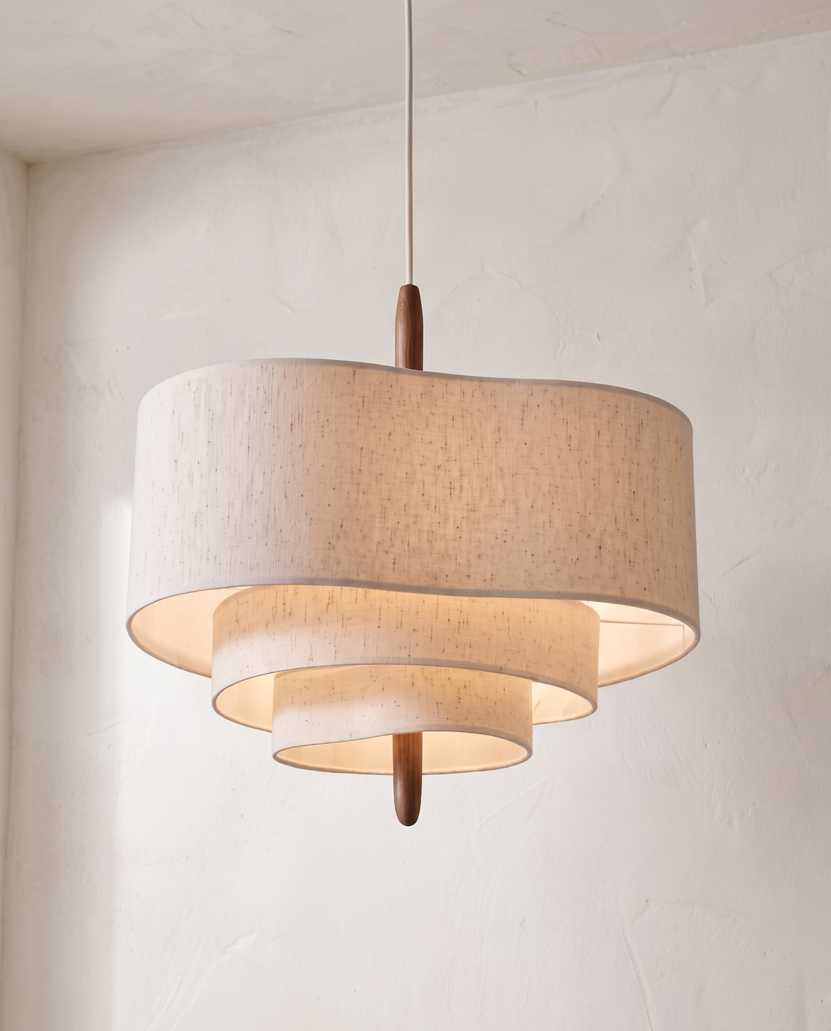 The Pagoda Pendant – 70 cm, three-tier beige fabric shade on a wooden stem