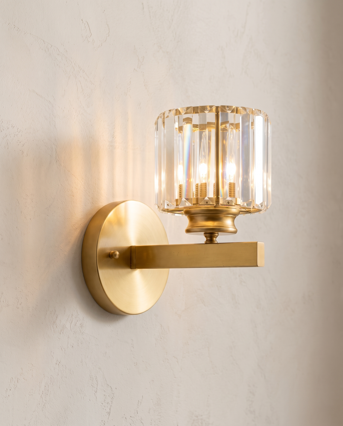 The Prism gold art deco crystal wall sconce, close-up detail of faceted K9 crystal — Selden Home product photography