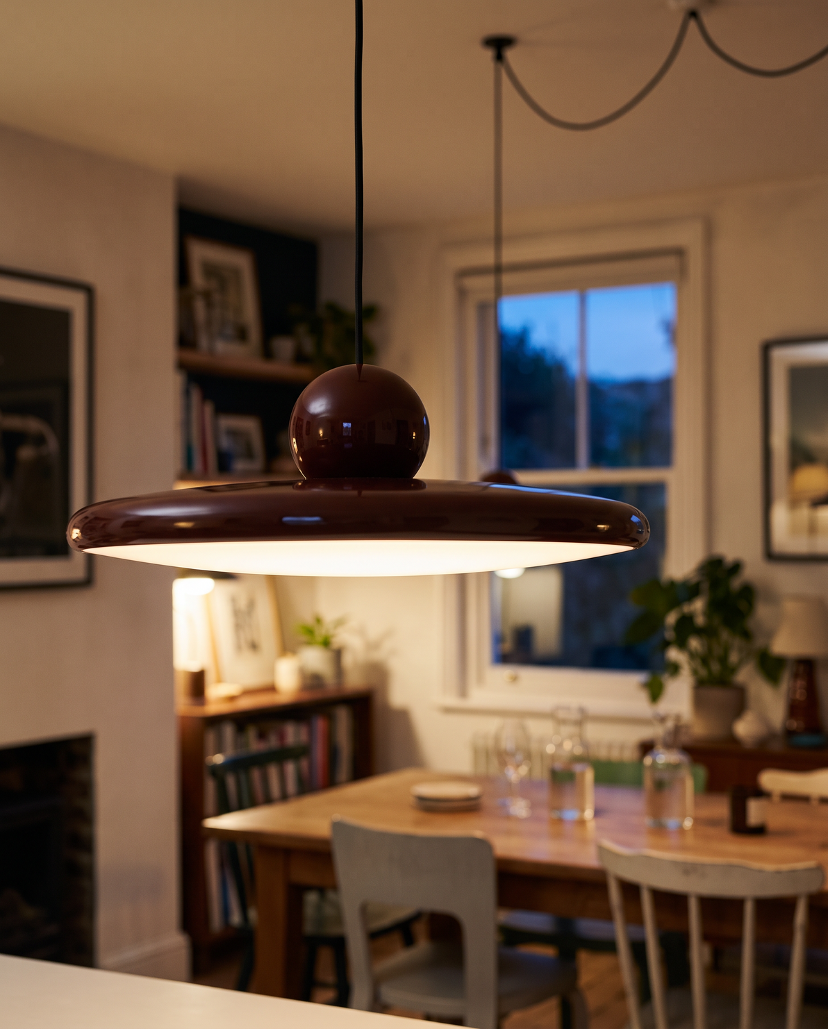 Close-up of the oxblood ball and lacquered disc of The Pulley