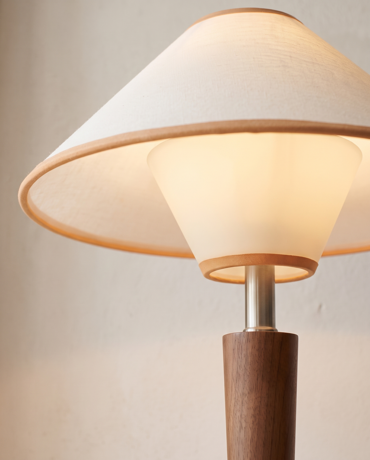 Close-up of the linen shade, tan trim and opal glass of The Spindle
