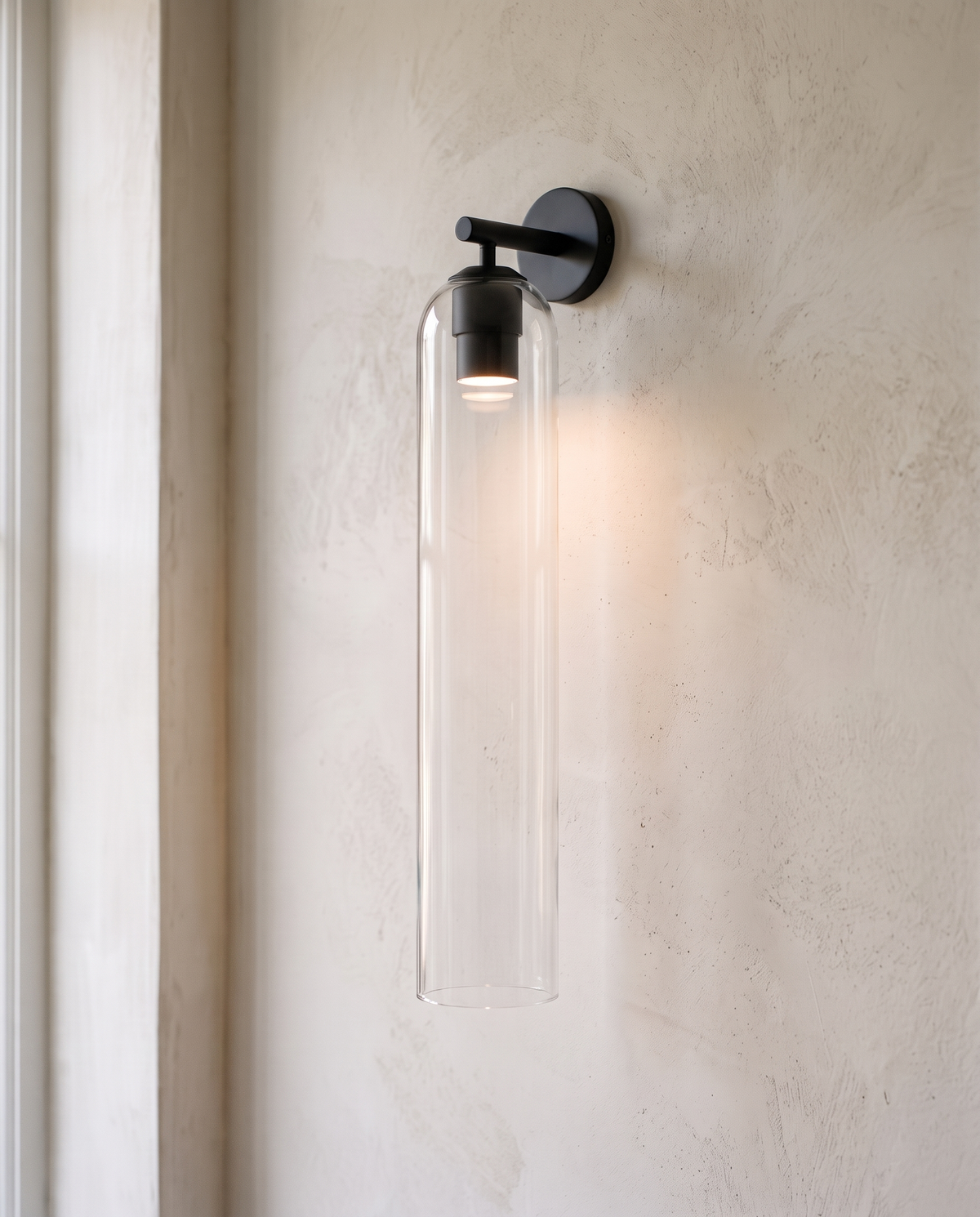 The Taper Wall Light, clear glass, black finish