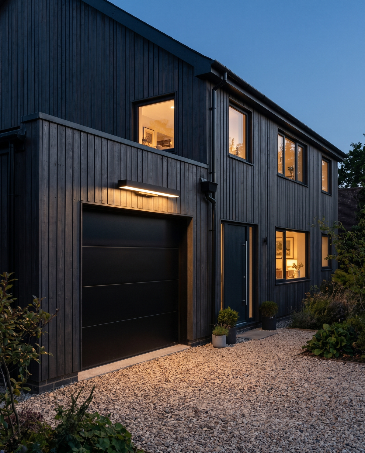 An 80 cm Threshold above a garage door on a timber-clad house