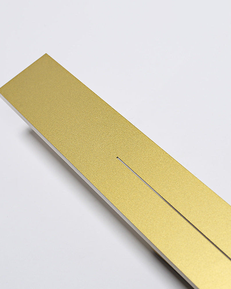 The Beam linear LED wall light, sand-finish gold face on a white body — Selden Home product photography (3)