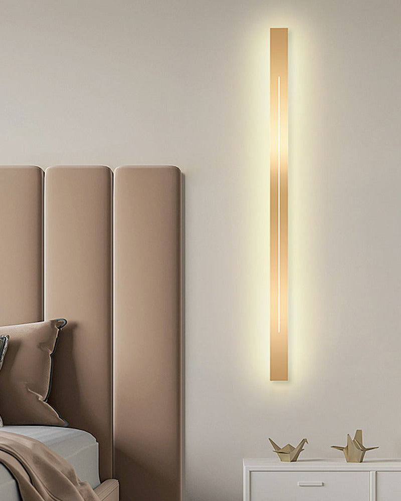 The Beam linear LED wall light, sand-finish gold face on a white body — Selden Home product photography (4)