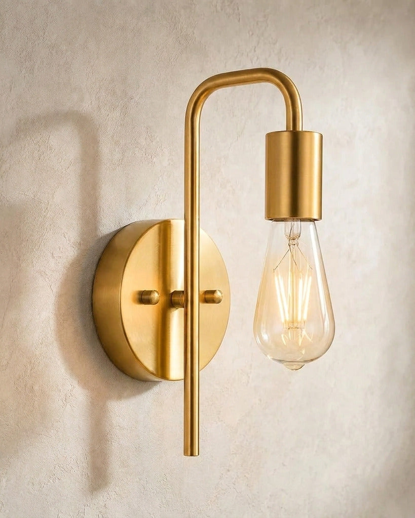 The Filament gold industrial wall sconce, close-up detail of arm and bulb holder — Selden Home product photography