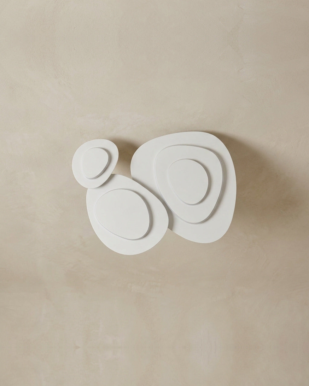 The Nimbus white cloud-shaped flush ceiling light, unlit, against a lime-washed plaster ceiling — Selden Home product photography